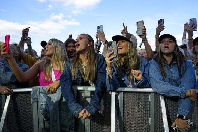 Attendees cheer while Megan Moroney performs on the Pony Up stage at the Two Step Inn country music festival at San Gabriel Park on Sunday, April 21, 2024 in Georgetown, Texas.